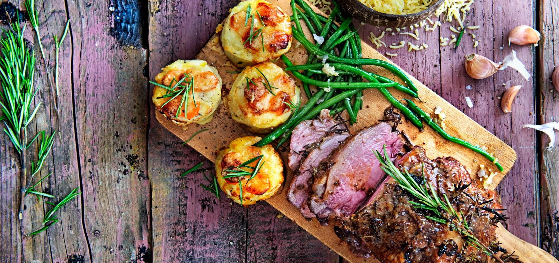 Leg of lamb with rosemary, garlic and gratin header