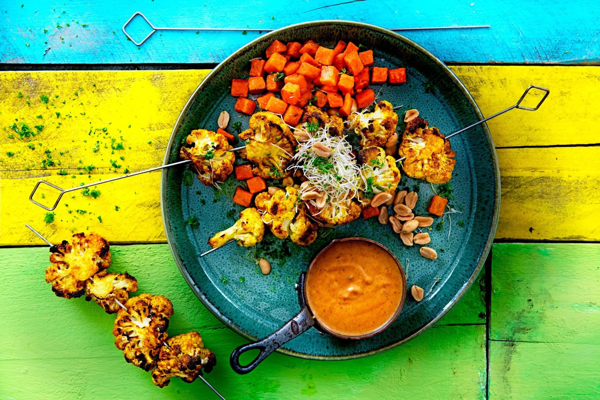 Thai cauliflower satay with sweet potato cubes 