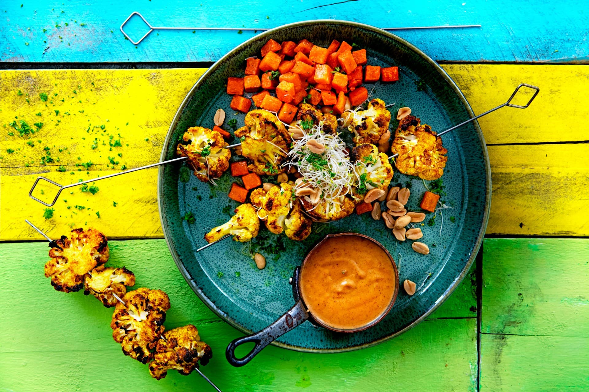 Thai cauliflower satay with sweet potato cubes