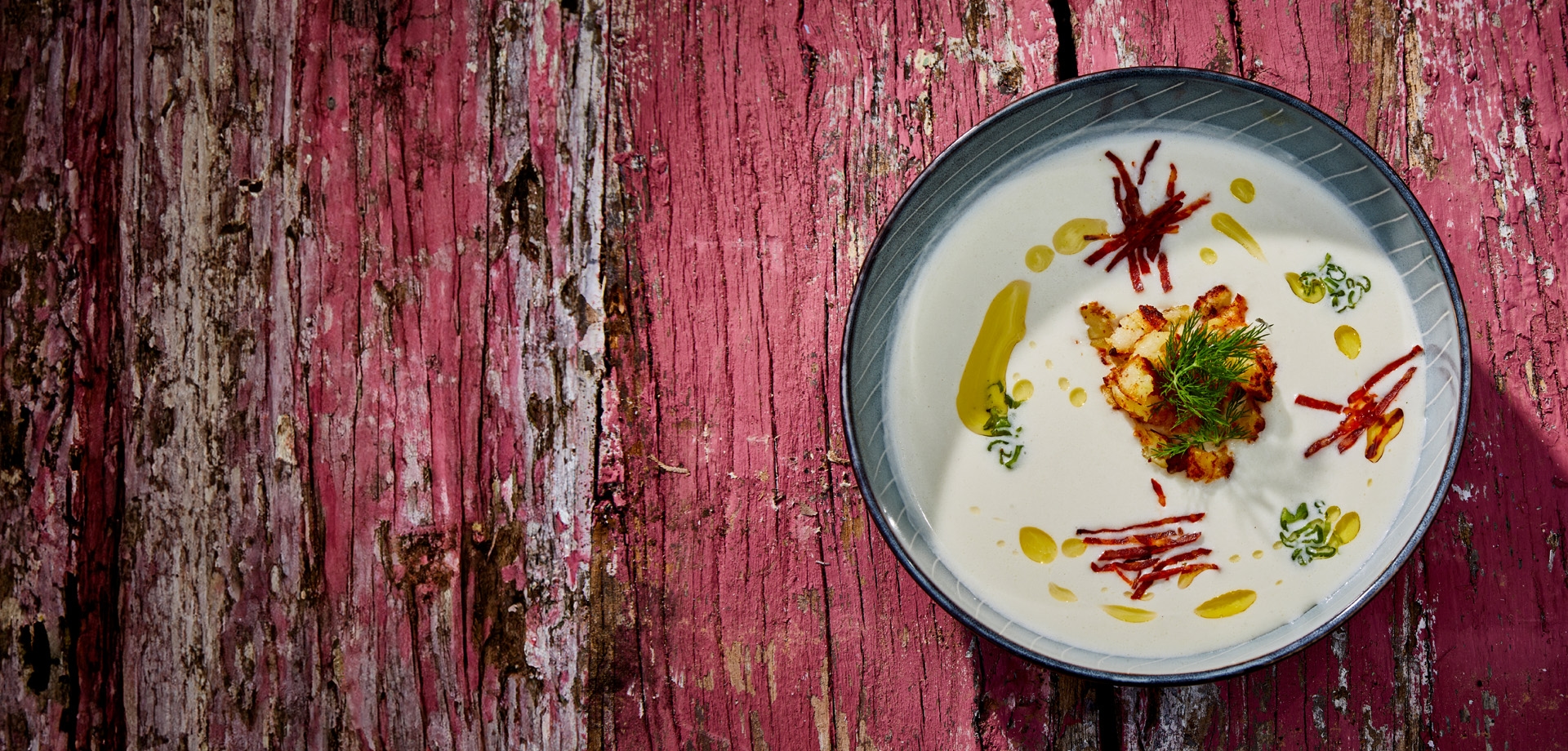header_cold_cold_potato_soup_with_spring_onion_spicy_chorizo_and_rosticroutons